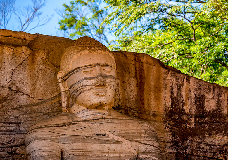 Close-up of statue of the standing Buddha in Gal Vihara. Polonnaruwa, Sri Lanka
